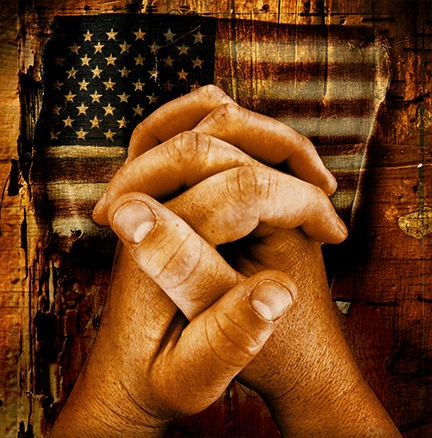 Praying over the American flag
